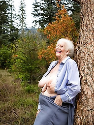 70 Years Old Lady with Large Breasts Expressing Joy